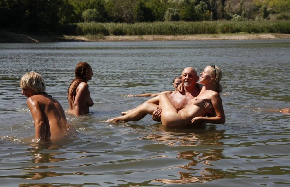 Naturist Family Event # 25 - Nudists relax beautifully—a sight to behold