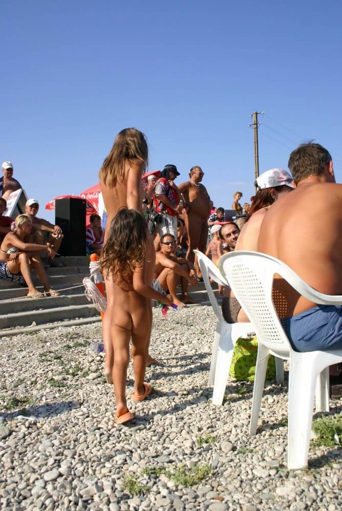 Naturist Standing Sideline - Nudists appreciate and love nature