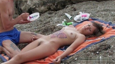 Naked body art on the beach Full HD video - A well-known naturist center