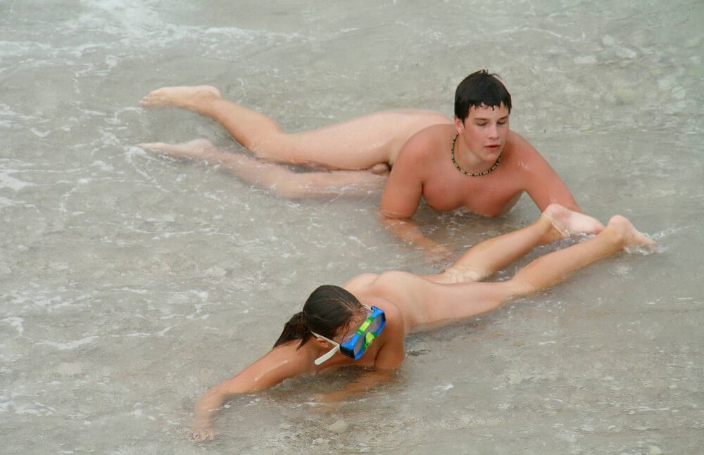 Wading In The Shallows pics - Nudist festivals are beautiful