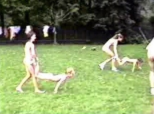A nudist gathering at the stadium and sports - Nudity as a natural aspect of human life