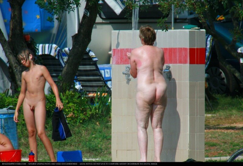 Covered in Towel Nudists-Boardwalk Biking - Taking off ones clothes is a way to strengthen inner harmony