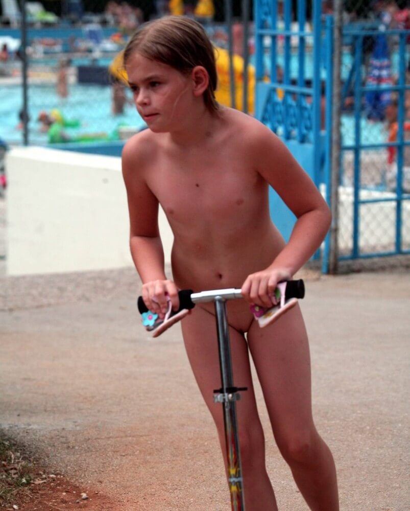 Pool-Side Naturist Scooter pics - Naturism is not a cult