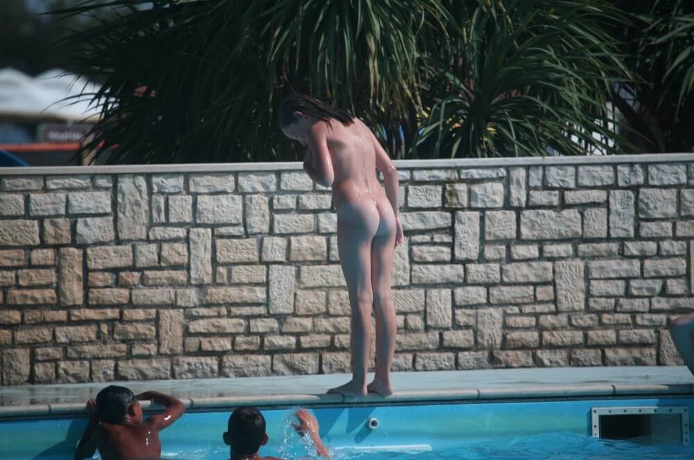 Naturist Pool-Side Singles pics - Overcoming inhibitions is one of the goals of nudism