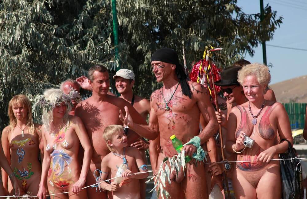 Naturist Day From Behind pics - Overcoming inhibitions is one of the goals of nudism