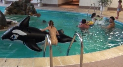 Indoor dolphin ride Full HD - Blending in with the crowd of nudists